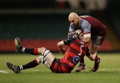 070424 - Llaneilli Wanderers v Glynneath - Division One Cup Final - Nick Gale of Llanelli Wanderers is tackled by Arwel Davies of Glynneath 