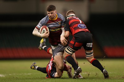 070424 - Llaneilli Wanderers v Glynneath - Division One Cup Final - Lewis Jones of Llanelli Wanderers is tackled by Arwel Davies and James Parry of Glynneath 