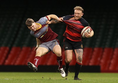 070424 - Llaneilli Wanderers v Glynneath - Division One Cup Final - Shaun Tennant of Glynneath is tackled by Jac Hart of Llanelli Wanderers 