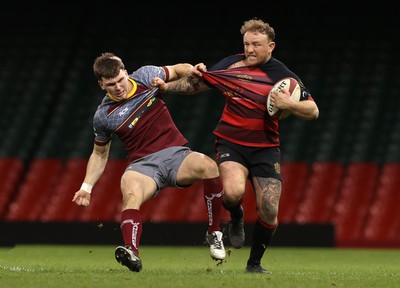 070424 - Llaneilli Wanderers v Glynneath - Division One Cup Final - Shaun Tennant of Glynneath is tackled by Jac Hart of Llanelli Wanderers 