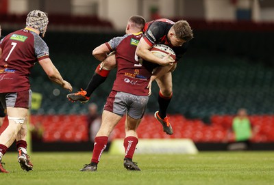 070424 - Llaneilli Wanderers v Glynneath - Division One Cup Final - Jed O�Reilly of Glynneath is tackled by Josh Weeds of Llanelli Wanderers 