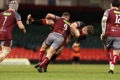 070424 - Llaneilli Wanderers v Glynneath - Division One Cup Final - Jed O�Reilly of Glynneath is tackled by Josh Weeds of Llanelli Wanderers 