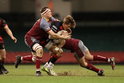 070424 - Llaneilli Wanderers v Glynneath - Division One Cup Final - Sam Harris of Glynneath is tackled by Nick Gale of Llanelli Wanderers 