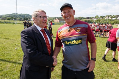 100525 - Llanelli Wanderers v Gorseinon - Admiral Championship West - WRU rep Chris Jones (L) with Llanelli Wanderers coach