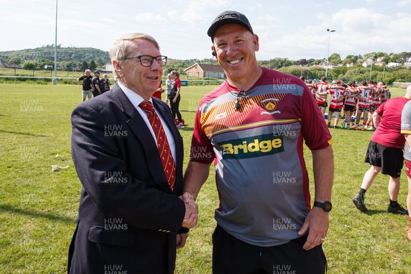 100525 - Llanelli Wanderers v Gorseinon - Admiral Championship West - WRU rep Chris Jones (L) with Llanelli Wanderers coach