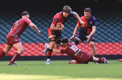 050425  Llanelli Wanderers v Tondu, WRU Championship Cup Final - Jamie Murphy of Tondu takes on Jake Baker of Llanelli Wanderers