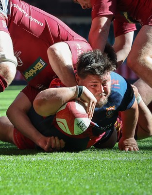 050425  Llanelli Wanderers v Tondu, WRU Championship Cup Final - Jake Lewis of Tondu looks to reach for the line