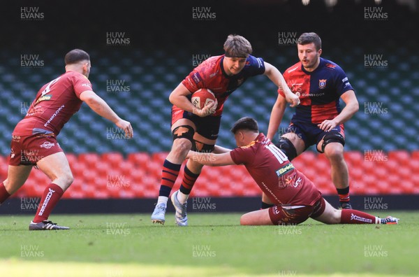 050425  Llanelli Wanderers v Tondu, WRU Championship Cup Final - Jamie Murphy of Tondu takes on Jake Baker of Llanelli Wanderers