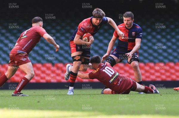050425  Llanelli Wanderers v Tondu, WRU Championship Cup Final - Jamie Murphy of Tondu takes on Jake Baker of Llanelli Wanderers