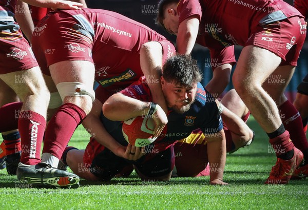 050425  Llanelli Wanderers v Tondu, WRU Championship Cup Final - Jake Lewis of Tondu looks to reach for the line