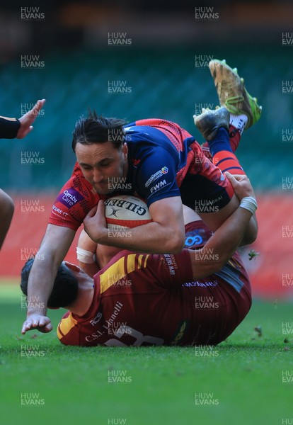 050425  Llanelli Wanderers v Tondu, WRU Championship Cup Final - Stu Young of Tondu takes on Rhydian Morgan of Llanelli Wanderers