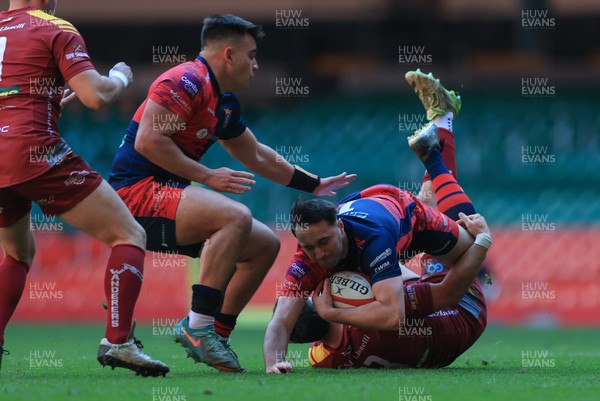 050425  Llanelli Wanderers v Tondu, WRU Championship Cup Final - Stu Young of Tondu takes on Rhydian Morgan of Llanelli Wanderers