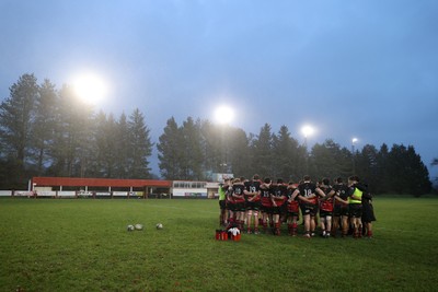 061225 - Llangennech v Brecon - WRU Premiership - Llangennech team huddle at full time