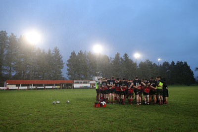 061225 - Llangennech v Brecon - WRU Premiership - Llangennech team huddle at full time
