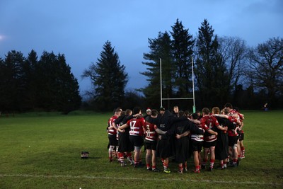 061225 - Llangennech v Brecon - WRU Premiership - Brecon team huddle at full time