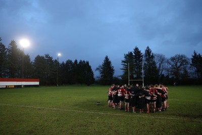 061225 - Llangennech v Brecon - WRU Premiership - Brecon team huddle at full time