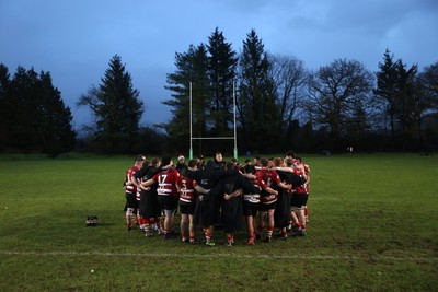 061225 - Llangennech v Brecon - WRU Premiership - Brecon team huddle at full time