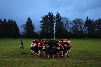 061225 - Llangennech v Brecon - WRU Premiership - Brecon team huddle at full time