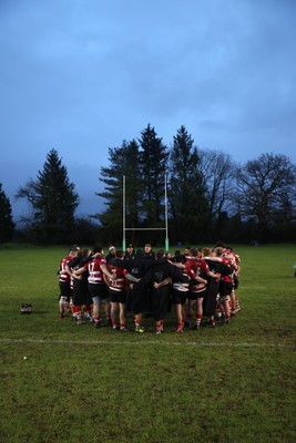 061225 - Llangennech v Brecon - WRU Premiership - Brecon team huddle at full time