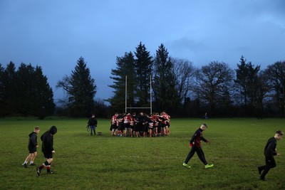 061225 - Llangennech v Brecon - WRU Premiership - Brecon team huddle at full time