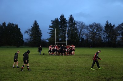 061225 - Llangennech v Brecon - WRU Premiership - Brecon team huddle at full time