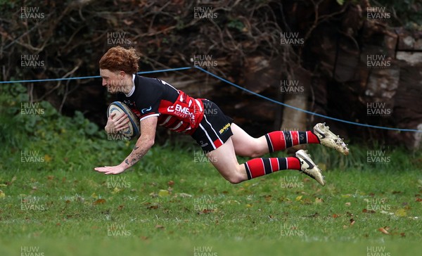 061225 - Llangennech v Brecon - WRU Premiership - Josh Jackson of Llangennech runs in to score a try
