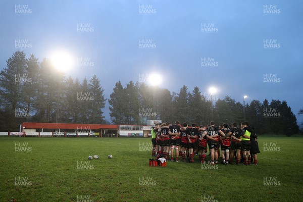 061225 - Llangennech v Brecon - WRU Premiership - Llangennech team huddle at full time