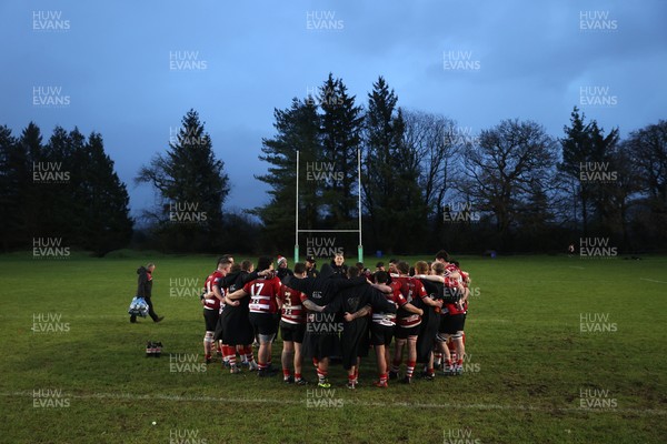 061225 - Llangennech v Brecon - WRU Premiership - Brecon team huddle at full time