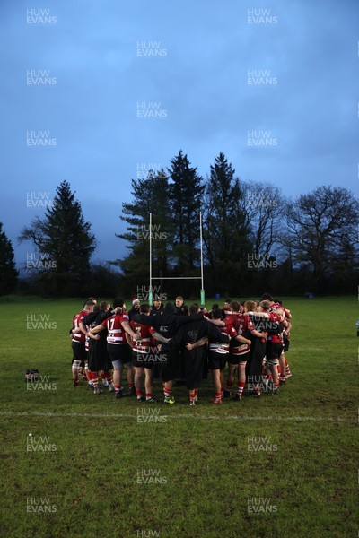 061225 - Llangennech v Brecon - WRU Premiership - Brecon team huddle at full time