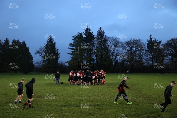 061225 - Llangennech v Brecon - WRU Premiership - Brecon team huddle at full time