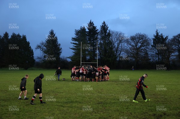 061225 - Llangennech v Brecon - WRU Premiership - Brecon team huddle at full time