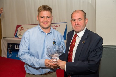 160526 - Llanharan RFC - Admiral National League 1 East Central Trophy Presentation - Llanharan captain Ieuan Pring receives the trophy from Jamie Willis WRU Council Member District C