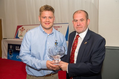 160526 - Llanharan RFC - Admiral National League 1 East Central Trophy Presentation - Llanharan captain Ieuan Pring receives the trophy from Jamie Willis WRU Council Member District C