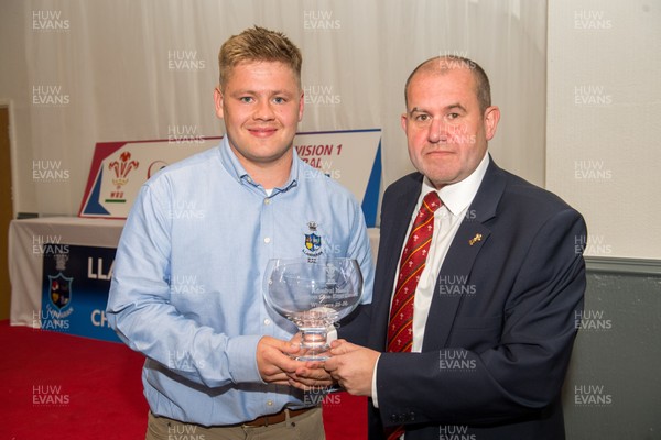 160526 - Llanharan RFC - Admiral National League 1 East Central Trophy Presentation - Llanharan captain Ieuan Pring receives the trophy from Jamie Willis WRU Council Member District C