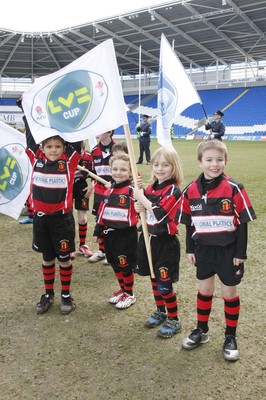 14.03.10 Cardiff Blues v Gloucester - LV=Cup Semi-Final - Dowlais RFC under 8's act as flag bearers before The Cardiff Blues take on Gloucester. 