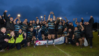 300424 Llanharan v Gilfach Goch, Admiral National League Division 2 East Central - Llanharan captain Scott Jones celebrates with the team and trophy