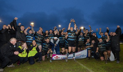 300424 Llanharan v Gilfach Goch, Admiral National League Division 2 East Central - Llanharan captain Scott Jones celebrates with the team and trophy