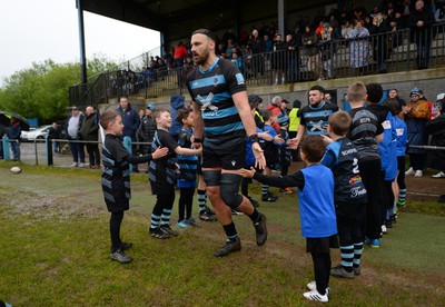 300424 - Llanharan v Gilfach Goch - National League Division 2 East Central - Players of Llanharan walking out of the tunnel