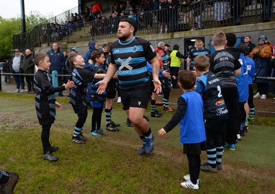 300424 - Llanharan v Gilfach Goch - National League Division 2 East Central - Players of Llanharan walking out of the tunnel