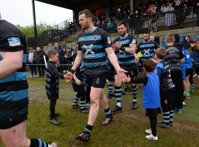 300424 - Llanharan v Gilfach Goch - National League Division 2 East Central - Players of Llanharan walking out of the tunnel