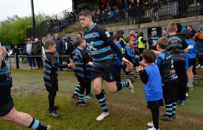 300424 - Llanharan v Gilfach Goch - National League Division 2 East Central - Players of Llanharan walking out of the tunnel