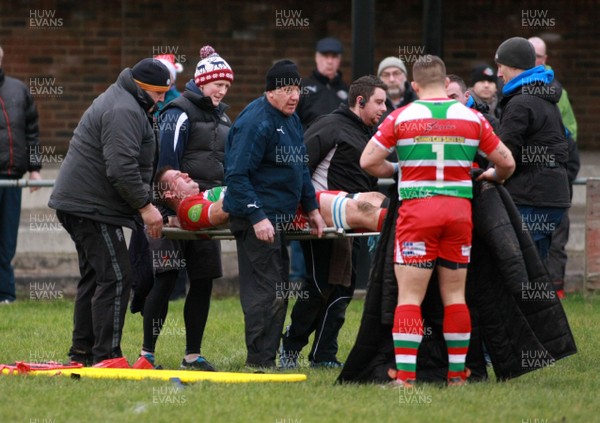 141213 Llanharan RFC v Ebbw Vale RFC - Swalec Premier League -Gareth Williams of Ebbw Vale is stretchered from the field