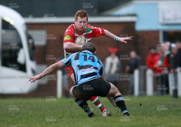 141213 Llanharan RFC v Ebbw Vale RFC - Swalec Premier League -David James of Ebbw Vale takes on Tom Farrer-Evans of Llanharan