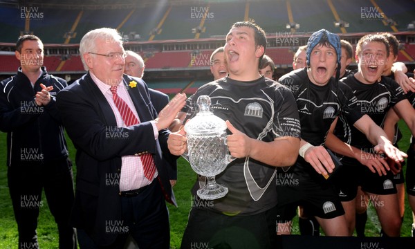 06.04.11 - Llanishen High School v Ysgol Bro Morgannwg - WSRU Senior Gullivers Sports Travel Final 2011 - Seb Vidal of Morgannwy receives the Welsh Schools Rugby Union Senior Gullivers Sports Travel trophy from WRU President Dennis Gethin. 