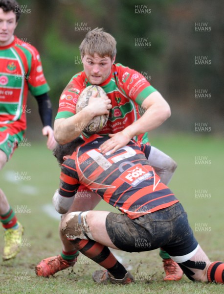 140117 - Llanishen v Pwllheli - WRU National Plate -  Dafydd Anwyl Williams of Pwllheli is tackled by Miles Anderson of Llanishen