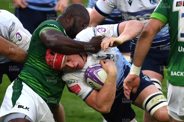 020421 - London Irish v Cardiff Blues - European Rugby Challenge Cup - James Botham of Cardiff Blues is tackled by Lovejoy Chawatama of London Irish