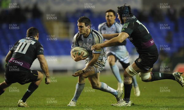 14.01.12 - London Irish v Cardiff Blues - Heineken Cup - Sam Warburton of Cardiff Blues is tackled by Adam Thompstone and David Sisi of London Irish. 