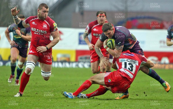 030213 London Welsh v Dragons - LV= Cup - Ieuan Jones of Dragons is tackled by Gonzeli Tiesi of London Welsh 