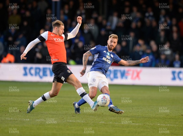 080220 - Luton Town v Cardiff City - Sky Bet Championship -  Joe Bennett of Cardiff clears from Luton's James Bree