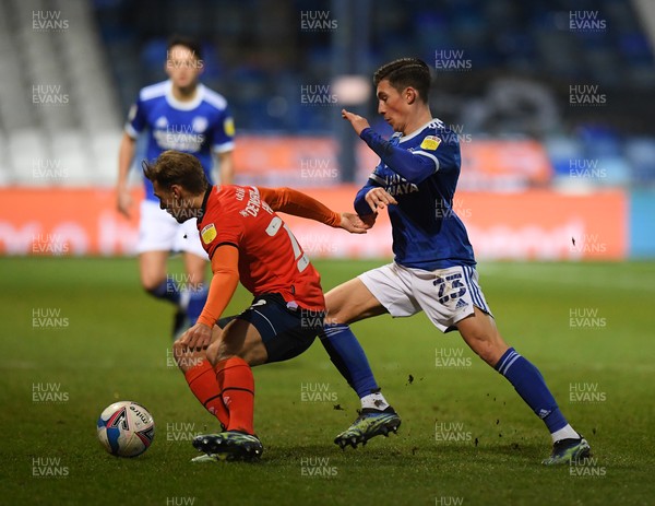 160221 - Luton Town v Cardiff City - Sky Bet Championship - Kiernana Dewsbury-Hall of Luton Town holds off the challenge from Harry Wilson of Cardiff City